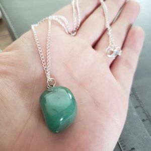 Necklace with green stone pendant